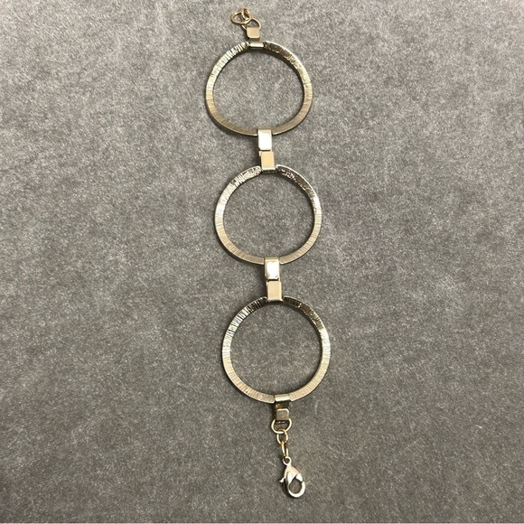 Guess gold-tone circular link crystal rhinestone bracelet - Picture 7 of 10